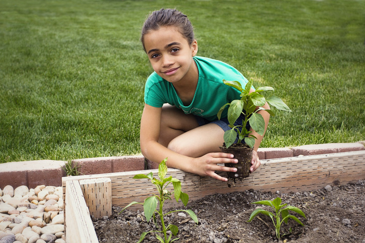 young girl gardening